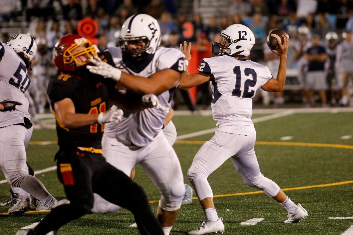 Chiawana quarterback Enoch Vargas (12), throwing a pass against Kamiakin earlier this season, has been consistent as can be this season, as he’s completed nearly 70 percent of his passes while throwing just three interceptions. The Riverhawks will need him at his best this week against Richland.