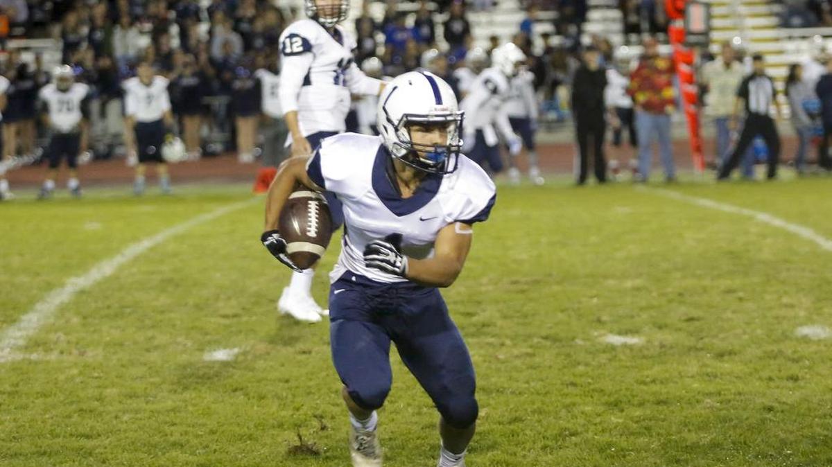 Chiawana's Tayden Jenkins (1), running the ball against Hanford last week at Fran Rish Stadium, combined with fellow running back Ethan Garcia to rush for 236 yards and four touchdowns in the Riverhawks’ 41-10 win over Kennewick on Friday.