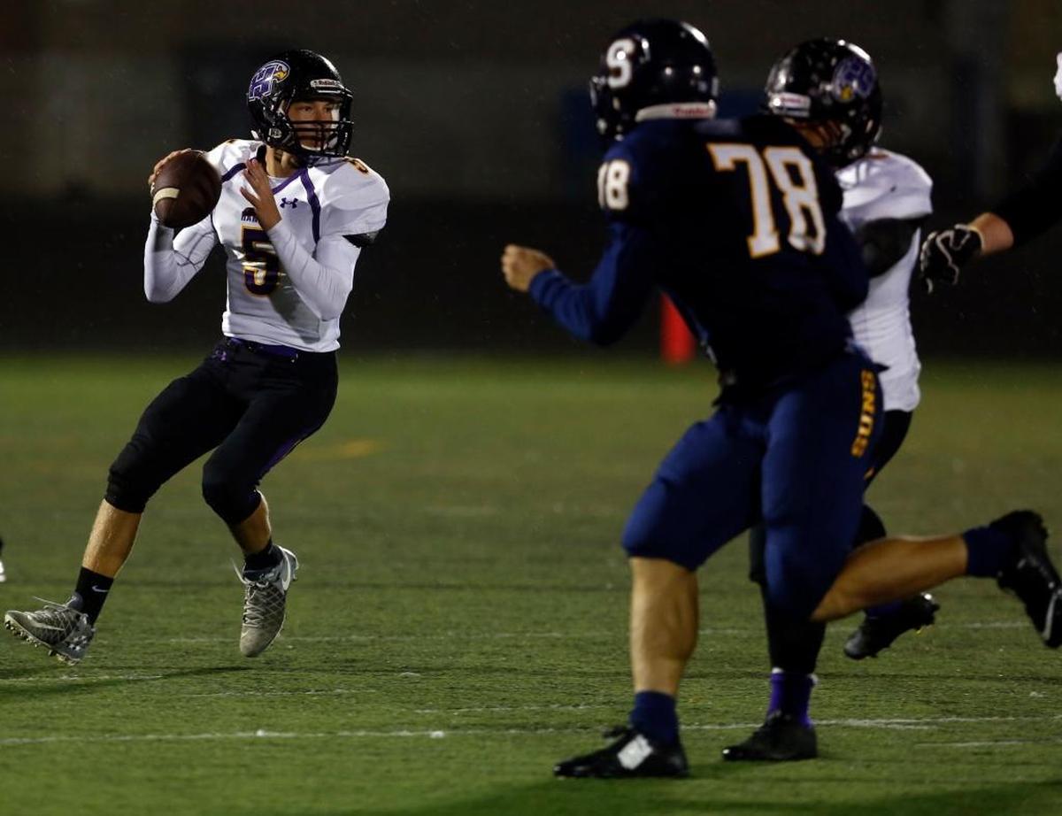 Hanford Falcons quarterback Garret Horner rears back to throw against Southridge during their 2016 clash at Lampson Stadium, which the Suns won 56-28. Horner was the MCC’s second-leading passer last season and is looking to put up big numbers again this year.