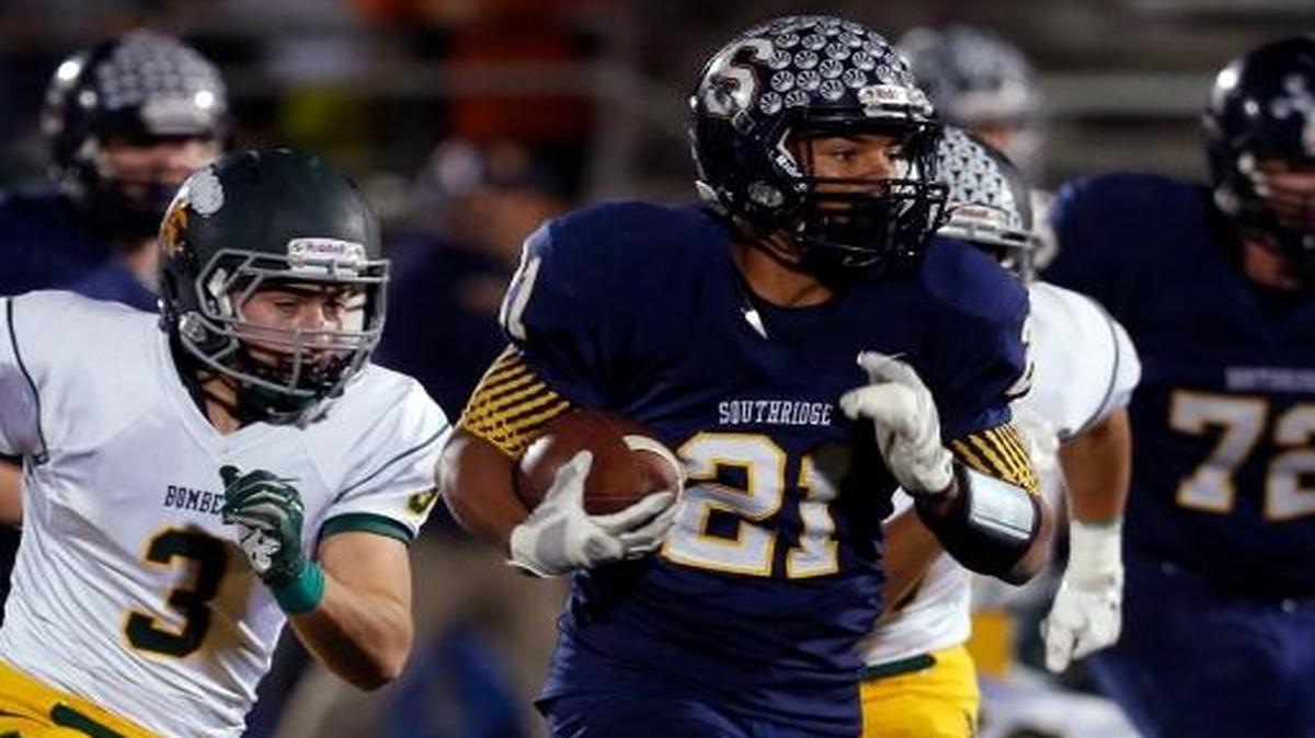 Senior Zayid Al-Ghani (21) returns to the backfield this fall for Southridge. Al-Ghani ran for 1,255 yards and 11 touchdowns last year to lead the Suns.