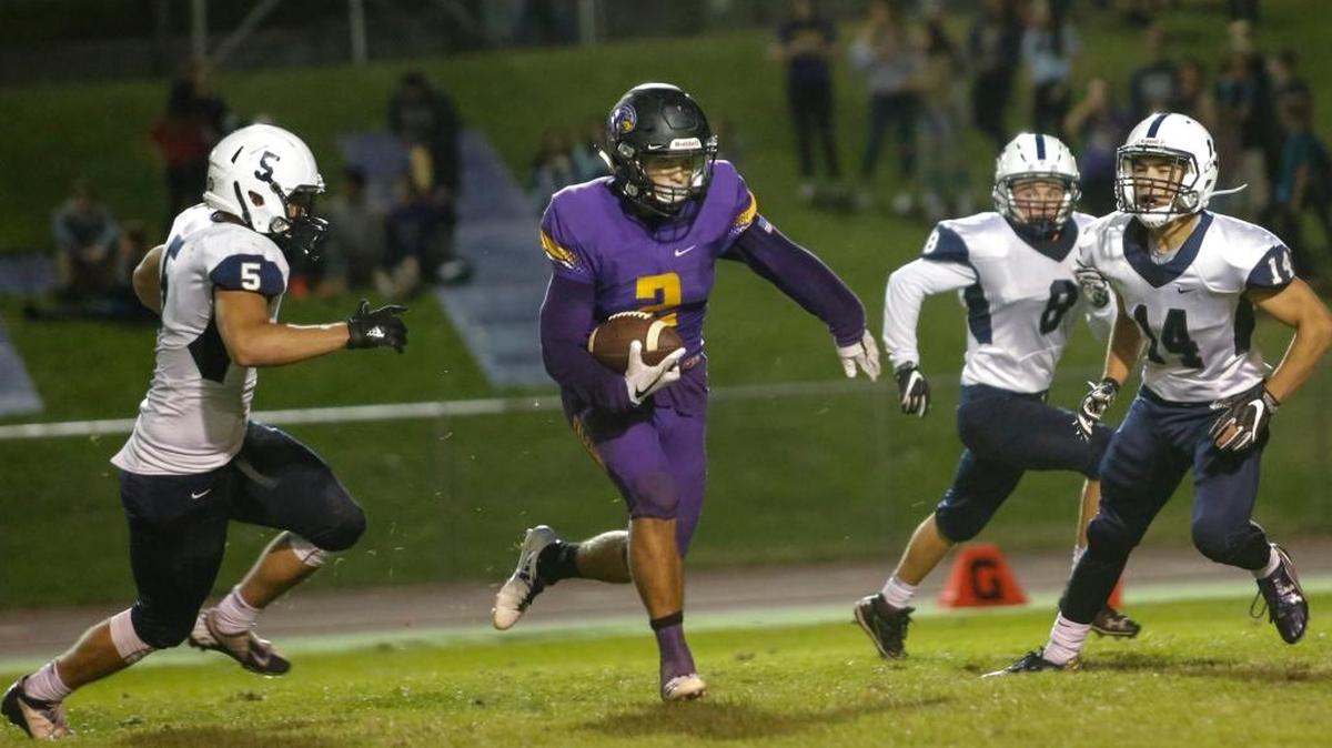 Hanford wide receiver Thomas Kitchens (2), running past Chiawana defenders last week at Fran Rish Stadium, has been one of quarterback Garrett Horner’s favorite targets ths season.