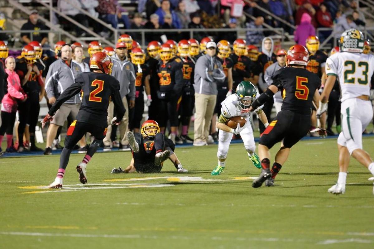Richland’s Adam Weissenfels (7) runs with the ball during last year’s game against Kamiakin at Lampson Stadium. Then a junior, he made the game-winning extra-point block in overtime to lift the Bombers to a 21-20 victory.