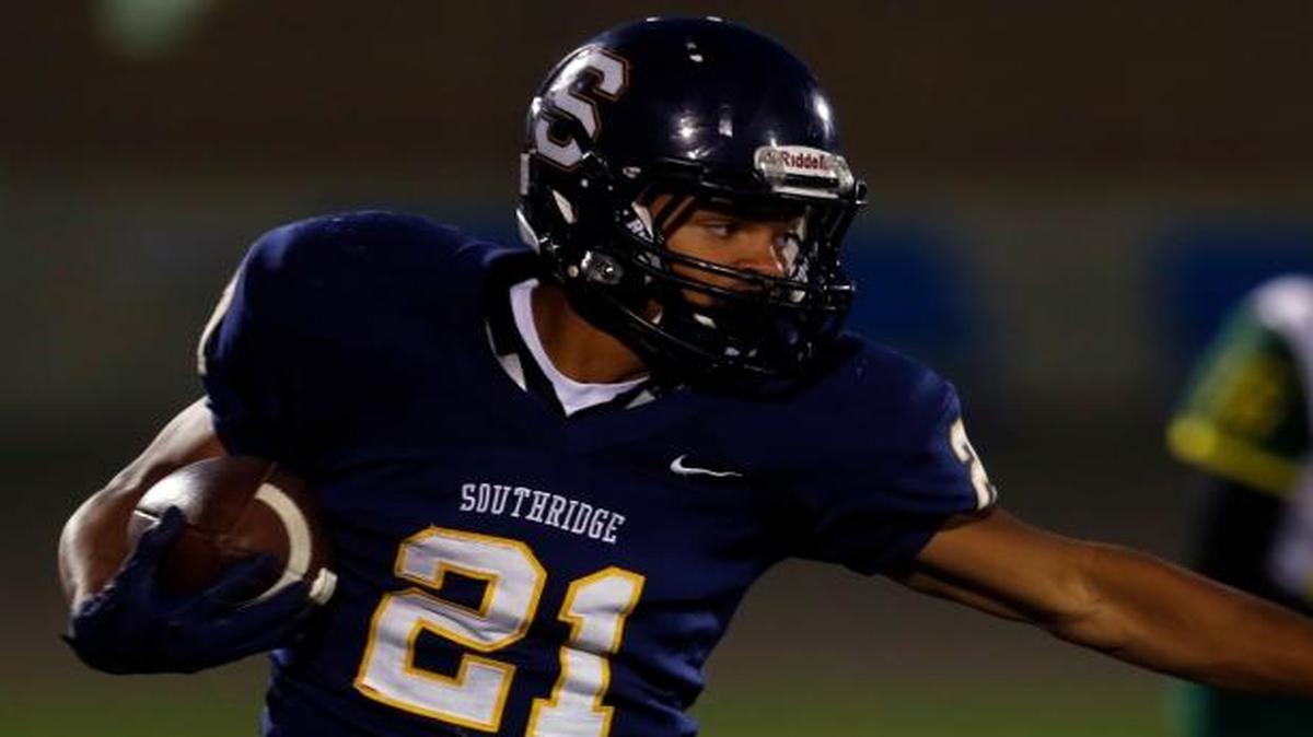 Southridge’s Zayid Al-Ghani (21) runs the ball against Shadle Park on Nov. 1 at Lampson Stadium in the Suns’ second of three games over the span of nine days. Southridge beat Shadle Park 44-20 to extend its season, then topped Juanita 35-29 on Saturday, Nov. 5, to make it into the state tournament for the first time since 2011.