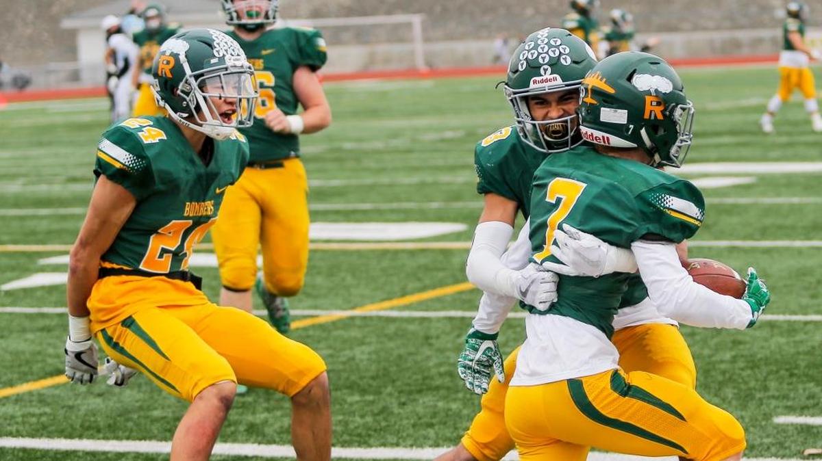 Richland’s Adam Weissenfels (7) celebrates his touchdown with teammates in the Bombers’ semifinal game Nov. 25 against Central Valley.