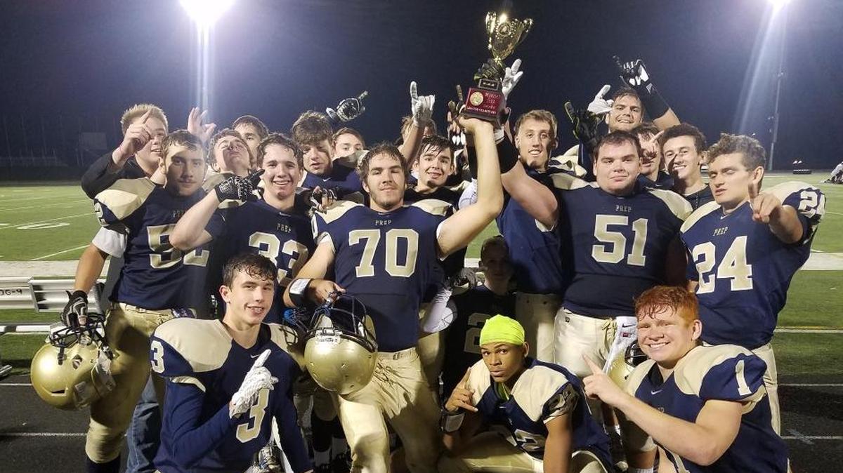 Tri-Cities Prep celebrates winning the EWAC regular-season title Friday night with a 44-6 win over Kittitas.