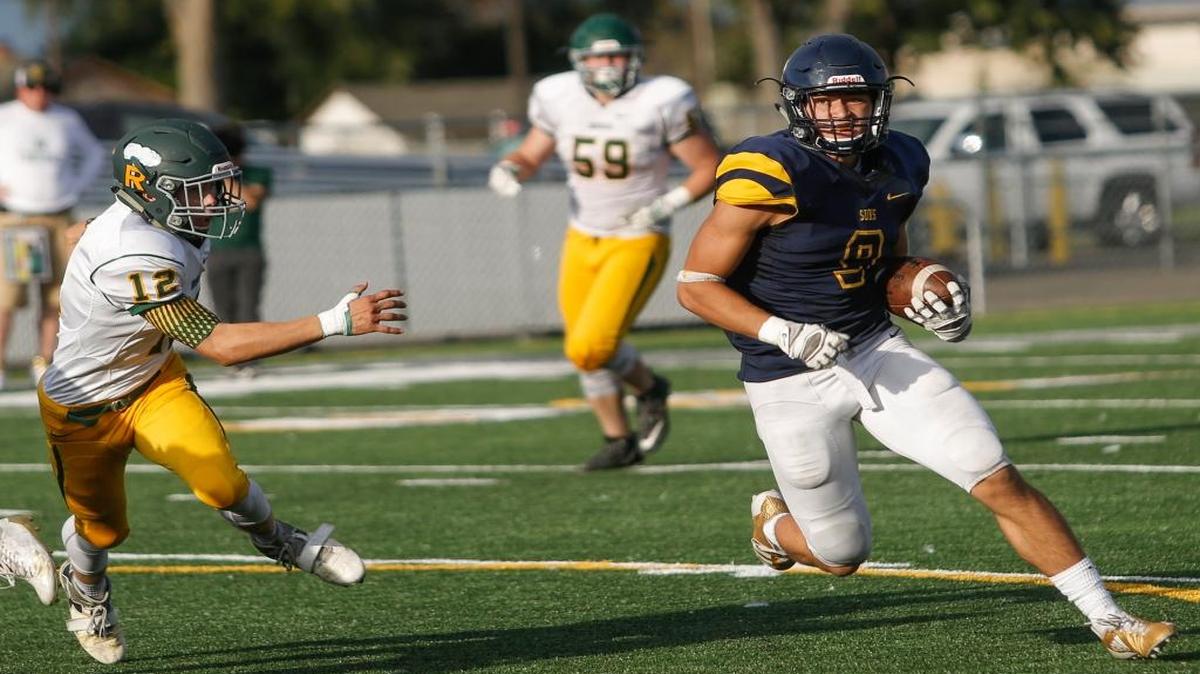Southridge's Eric Strayrook (9), running with the ball last week against Richland, is the MCC’s second-leading receiver through four weeks, behind teammate Peyton Monson.