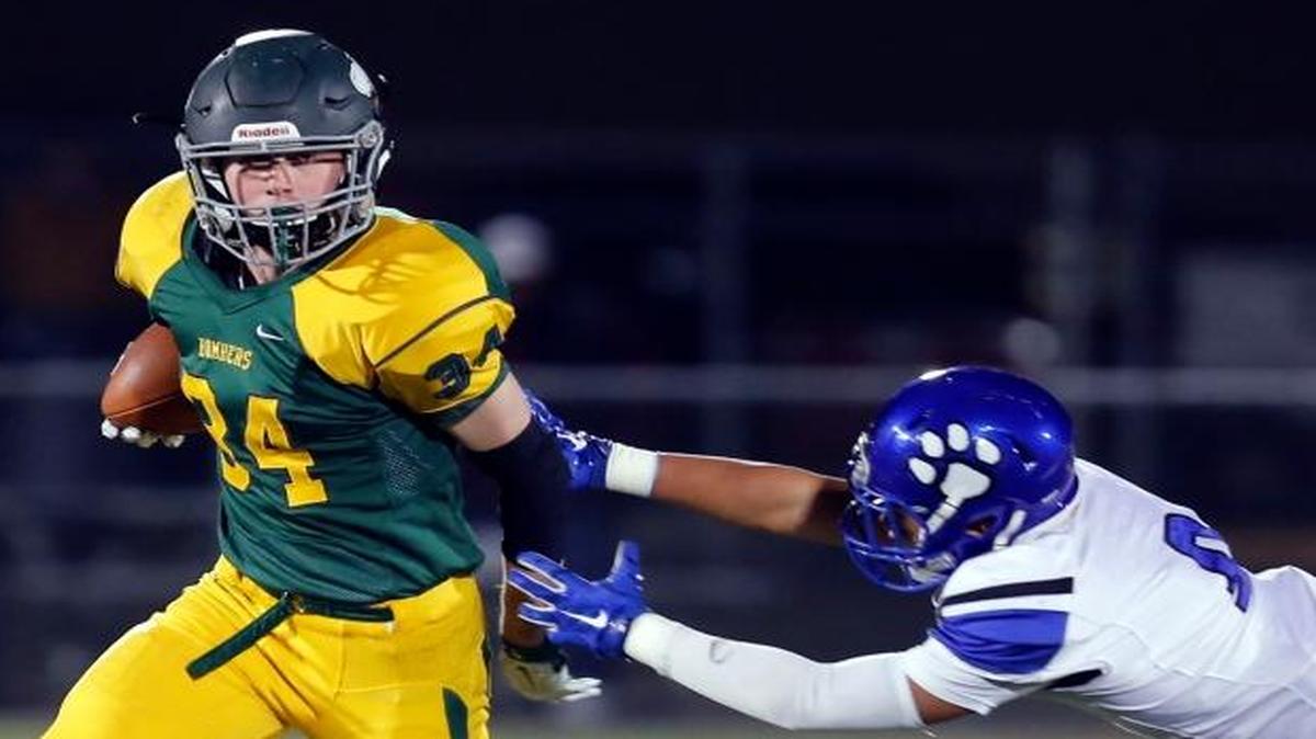 Ben Stanfield (34) scored four touchdown in Richland’s 49-28 win over Bothell in the state quarterfinals on Saturday, his first career multi-touchdown performance