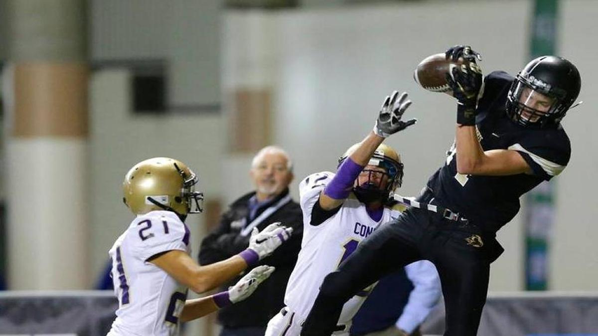 Corbin Christensen, right, goes up for a catch against Connell during the 2016 state championship, which Royal won 25-10. Christensen caught 19 touchdown passes last year, and will likely be the top target for first-year, junior quarterback Sawyer Jenks.