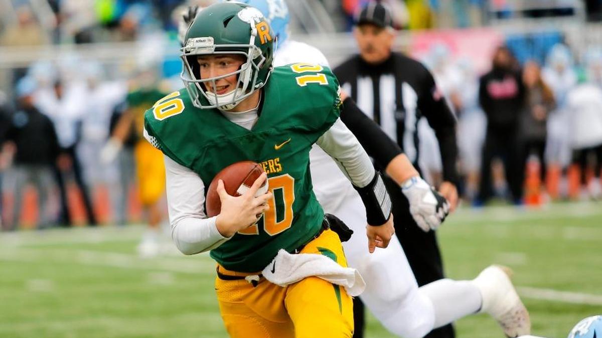 Richland quarterback Cade Jensen runs with the ball during a 4A state semifinal game against Central Valley on Saturday at Edgar Brown Memorial Stadium in Pasco. Bombers beat the Bears 42-10.