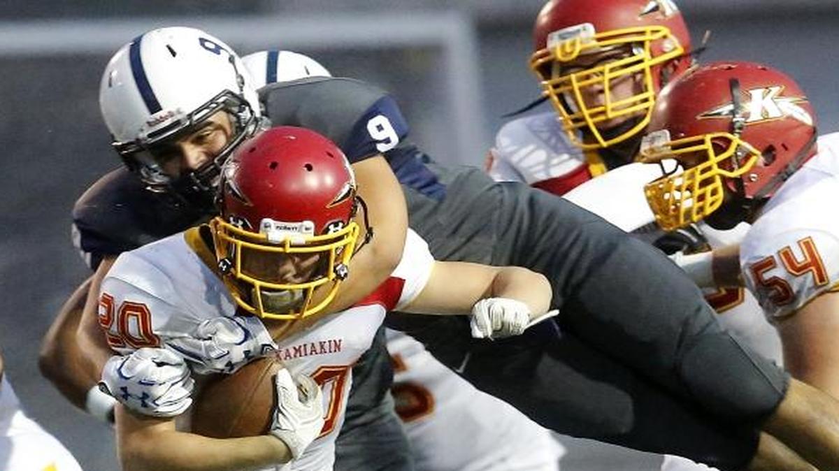 Kamiakin running back Jethro Questad (20) has signed a letter of intent to play football at Simon Fraser University.