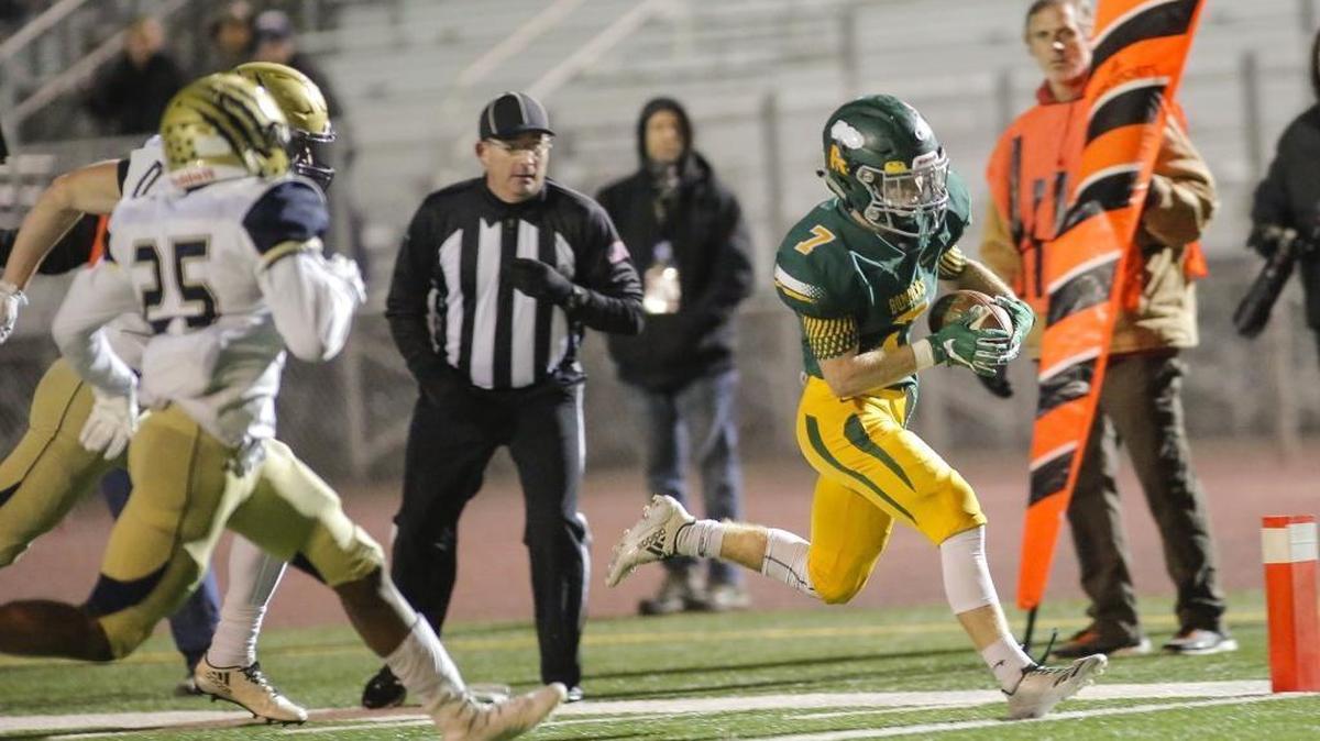 Richland wide receiver Adam Weissenfels, right, was a named the Mid-Columbia Conference’s Defensive Player of the Year. He also was named a first-team wide receiver and special teams player.