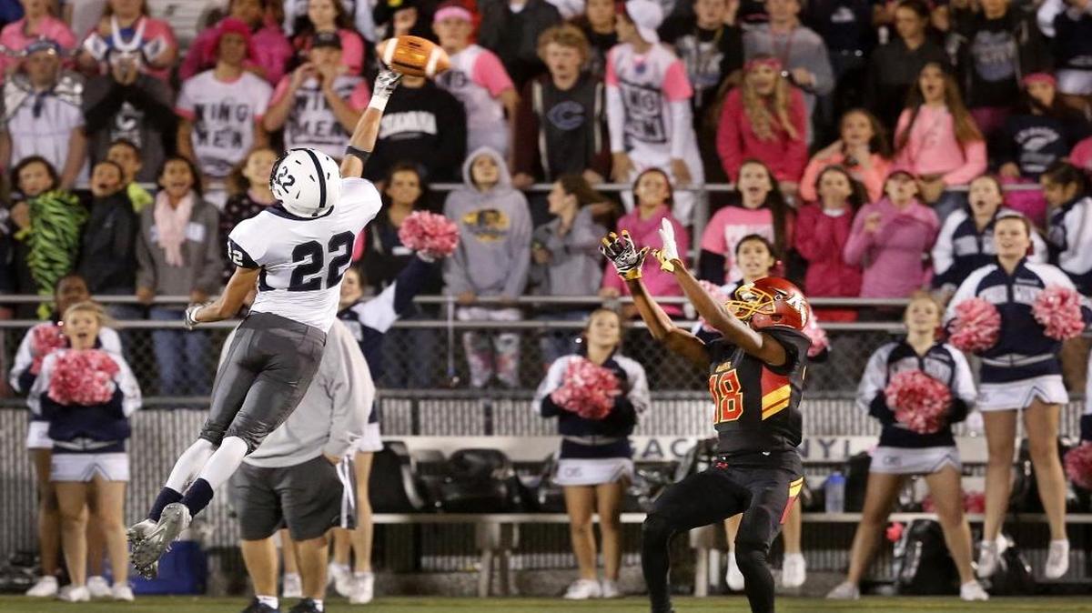 
Chiawana defender Hayden Carrasco (22) tips away a pass intended for Kamiakin’s Darreon Moore (18) during Friday night’s game at Lampson Stadium in Kennewick.
