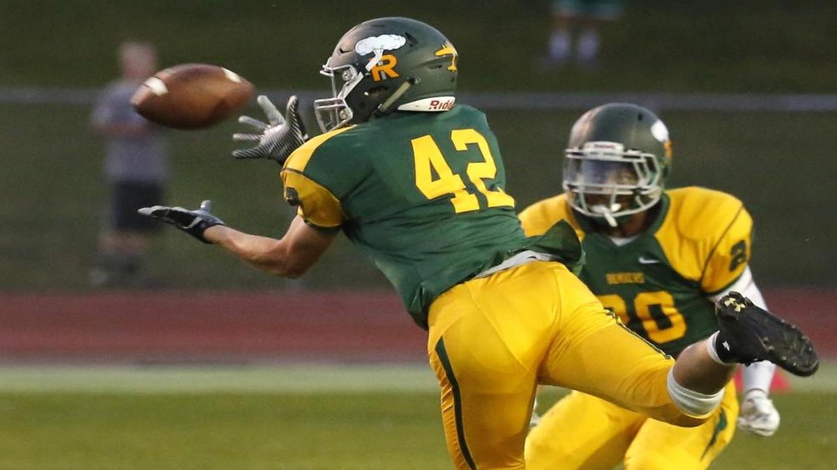 
Richland’s Taiton Gillespie (42) makes a diving interception in front of his teammate Ryan Piper (20) during Friday night’s game against Chiawana at Fran Rish Stadium in Richland.
