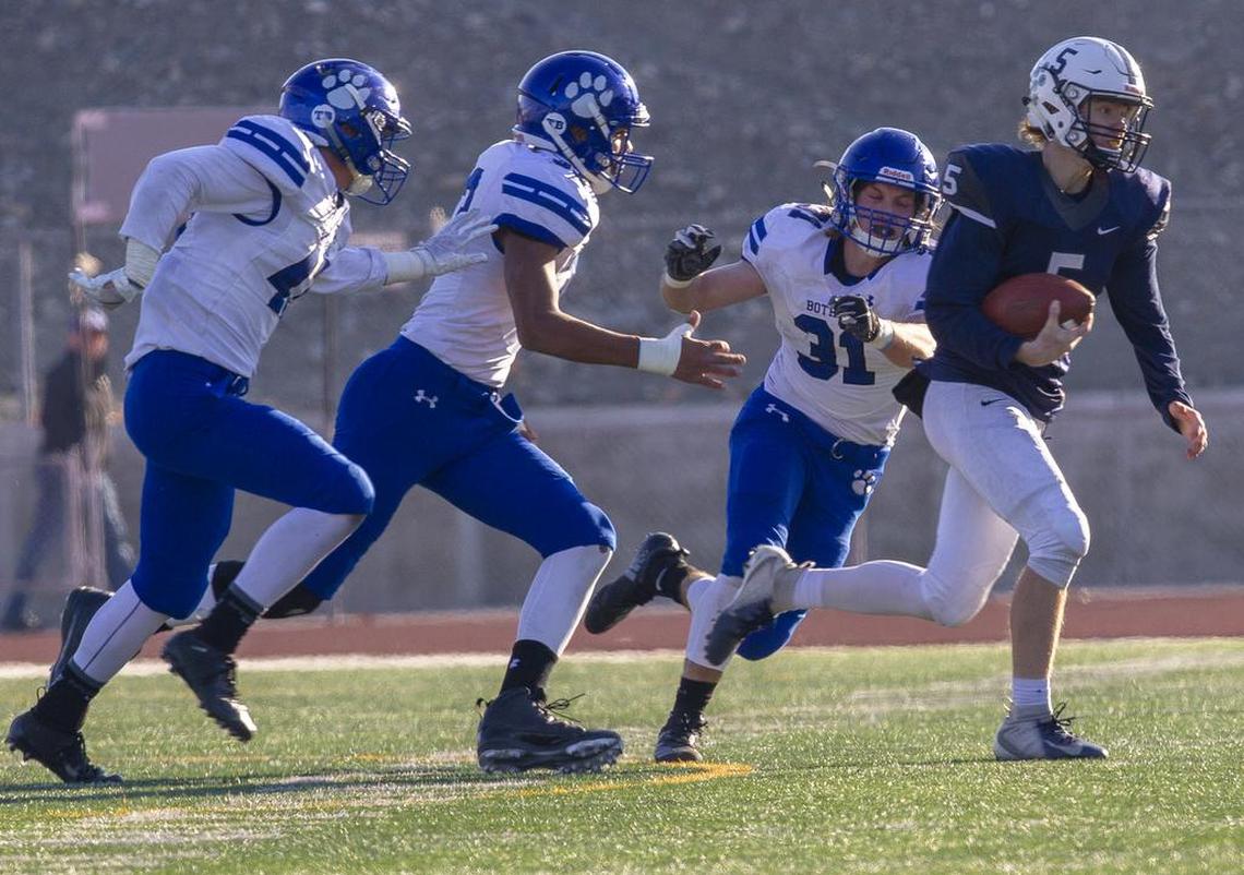 Bothell’s defense chases after Chiawana’sPreston Vine (5) as he runs with the ball during a high school football playoff game at Edgar Brown Stadium in Pasco on Saturday, Nov. 11.