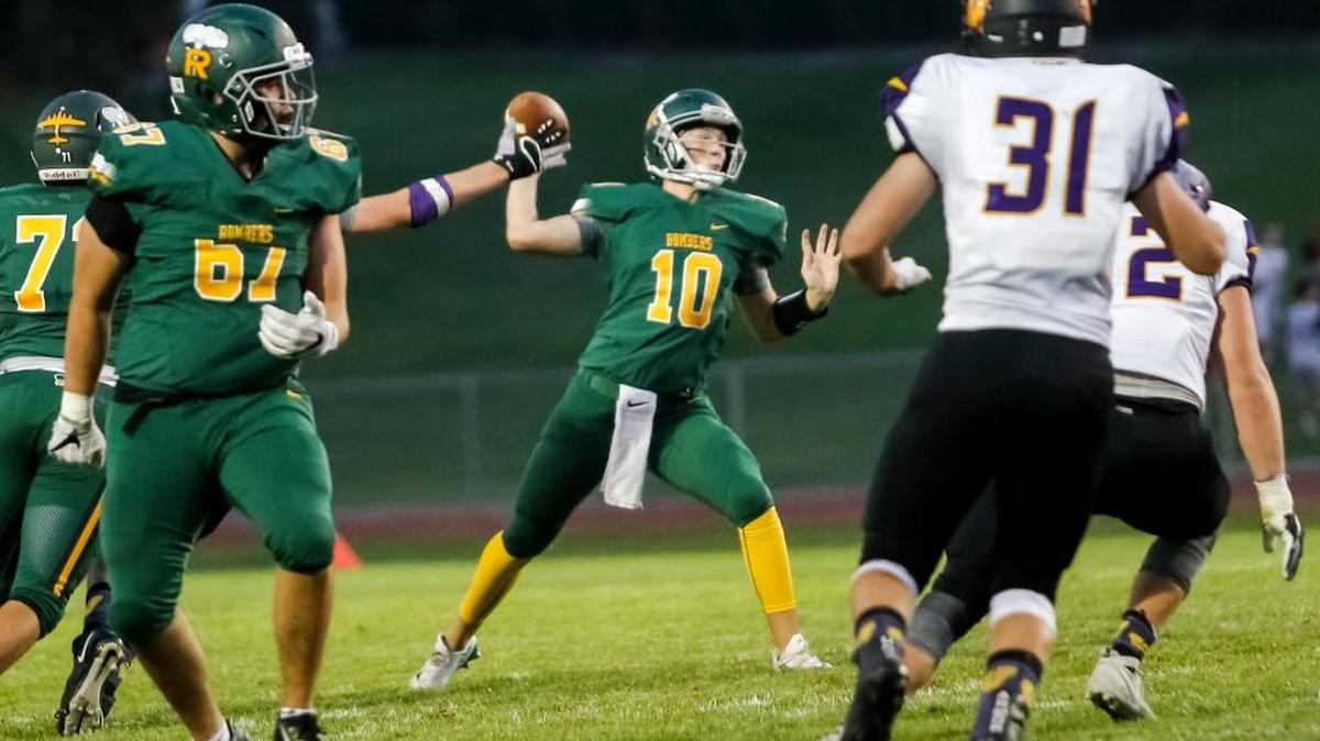 Richland quarterback Cade Jensen (10), throwing a pass against Wenatchee earlier this season, had five touchdown passes and ran in another score in the Bombers’ 50-0 win over Hanford on Friday.
