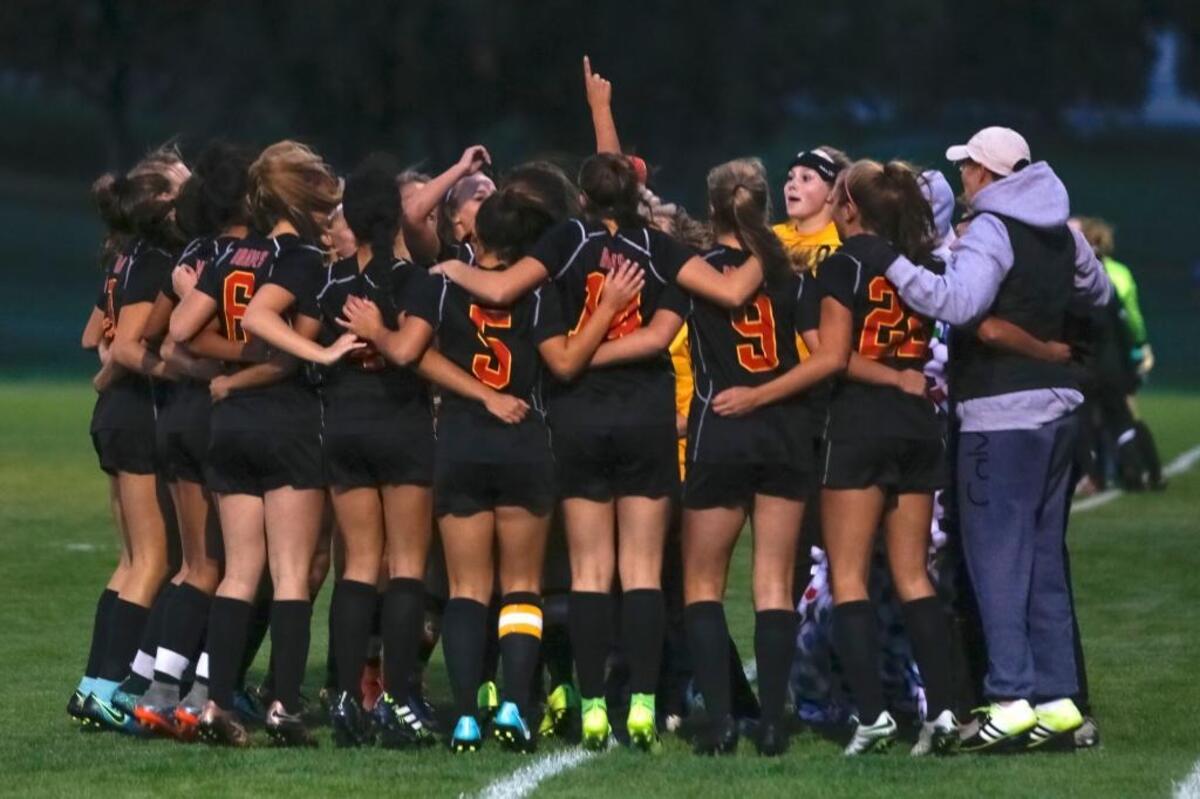 The Kamiakin girls soccer team, huddling before a match against Richland Sept. 19, is 10-0 heading into Tuesday’s game against Chiawana. They face Richland again Thursday, and wrap up the week against Hanford on Saturday morning.