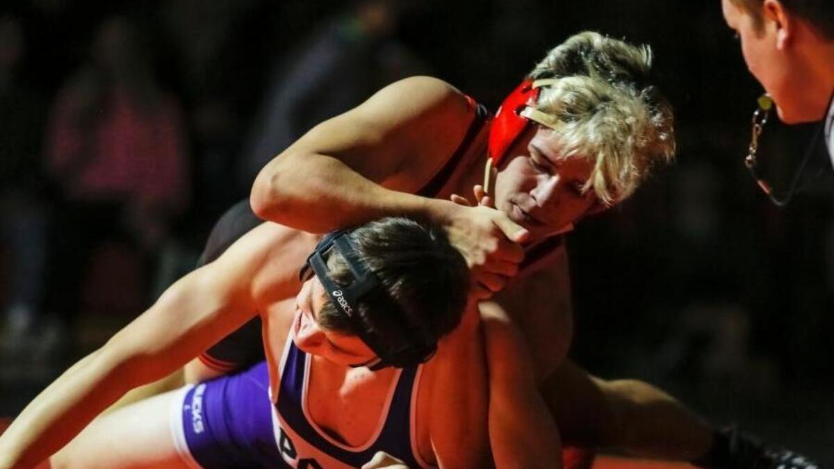 Kamiakin’s Kevin Cornejo, top, wrestles with Pasco’s Jay Hallibaugh during their 152-pound match Thursday at Kamiakin High School. Cornejo pinned Hallibaugh in 2:35.