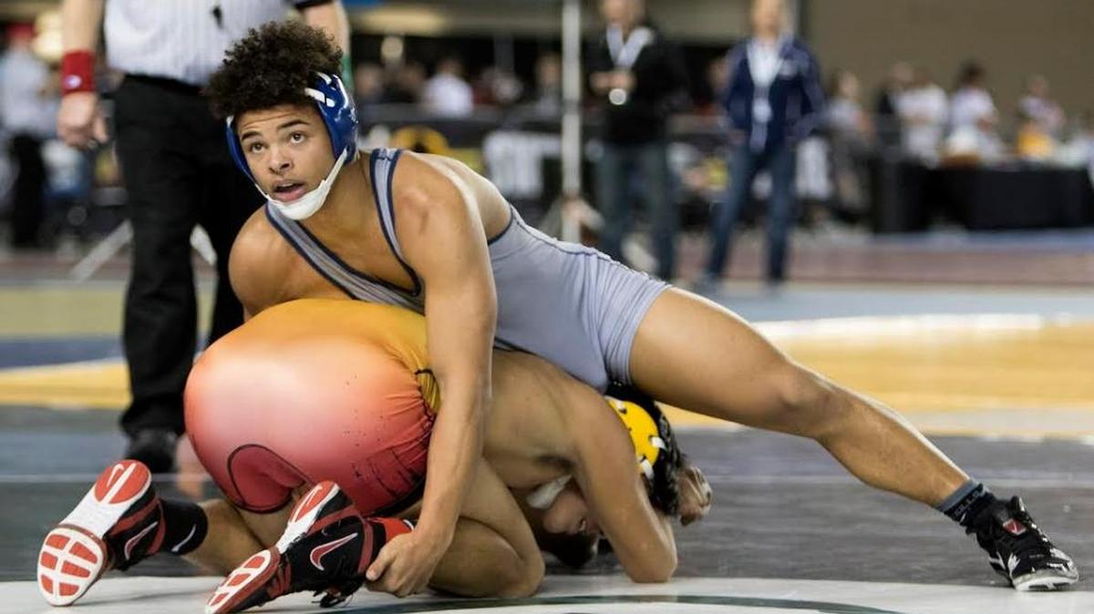 Southridge’s Zayid Al-Ghani, top, works on controlling Marysville-Pilchuck’s Keith Pablo during their Class 3A 170-pound state championship match Feb. 18 in Tacoma. Al-Ghani won 5-2 to take the title.