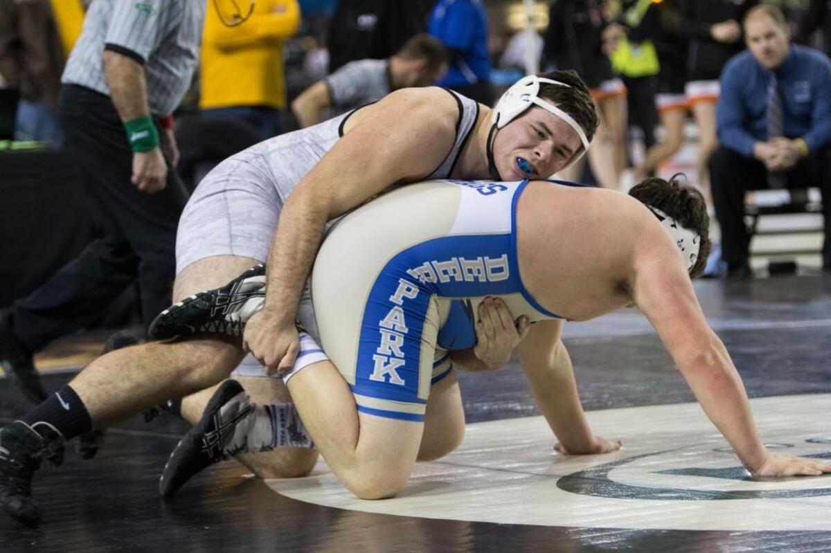 Connell’s Seer Deines, top, looks to keep Deer Park’s Gabe Sanchez on the mat after a takedown during their 285-pound championship match at the 1A state wrestling tournament Saturday at the Tacoma Dome. Deines took home the title with a 5-0 victory.