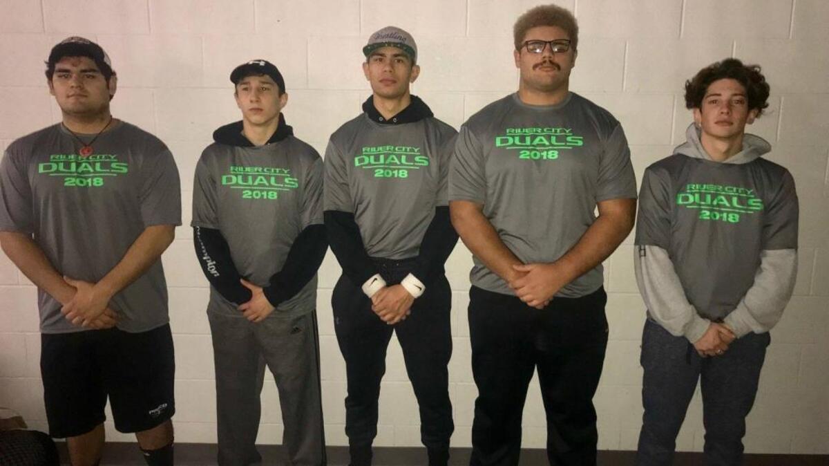 Pasco wrestlers Anthony Cortez (from left), Isaiah Gonzalez, Avery Burrows, Davion Pruitt and Dante Sauceda won all five of their matches at the River City Duals in Post Falls.