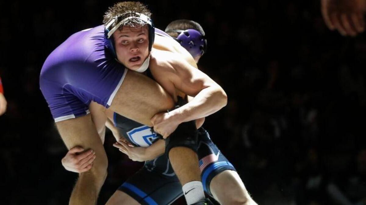 Chiawana’s Riley Cissne (bottom) wrestles with Pasco’s David Tobias in a 145-pound bout during a Mid-Columbia Conference dual on Saturday at Pasco High School. Cissne won 9-7 in in overtime. Chiawana won the match 33-25.