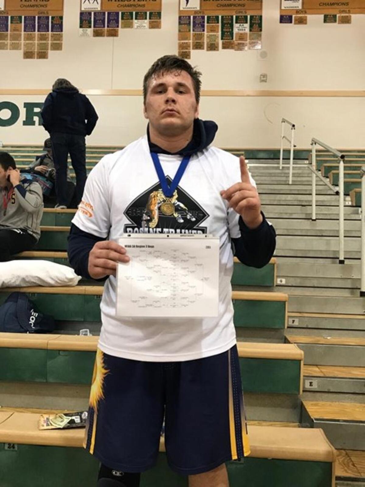 Southridge’s Yuriy Slutskiy won the 285-pound regional title Saturday with an 11-3 win over Joe Lawrence of Marysville Pilchuck.
