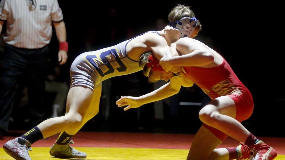 Riley Gurr, right, of host Kamiakin High School, wrestles Southridge’s Mikael Failor at 126 pounds during Thursday night’s Mid-Columbia Conference regular-season finale. Gurr pinned Failor in 1 minute, 8 seconds.