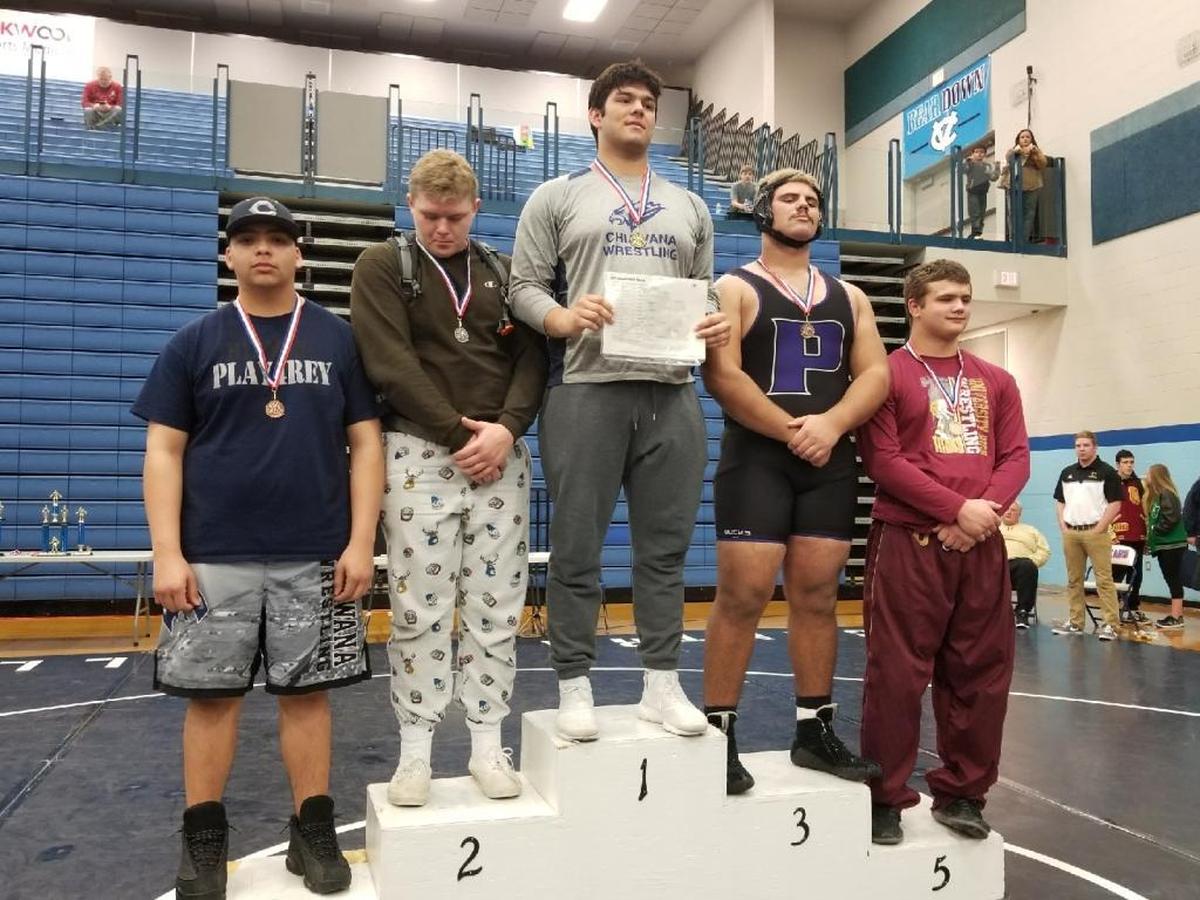 Chiawana’s Josh Alvarez (center) won the 285-pound title Saturday at the Inland Empire Classic in Spokane. Pasco’s Davion Pruitt (second from right) was third.