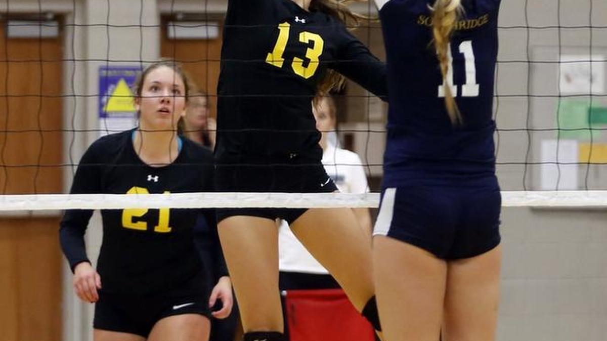 
Kamiakin’s Jill Sands (13) hits a ball over the net to Southridge’s Maddisen McNeill (11) on Thursday during a match at Southridge High School. See more photos at www.tricityherald.com.

