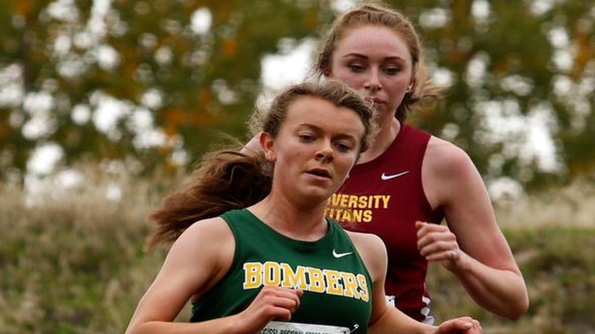 Richland High School’s Katie Andrus competes Saturday during the District 5/8 Class 4A regional cross country meet at Carmichael Middle School in Richland. Andrus finished seventh to advance to next weekend’s state meet in Pasco. See more photos at www.tricityherald.com.