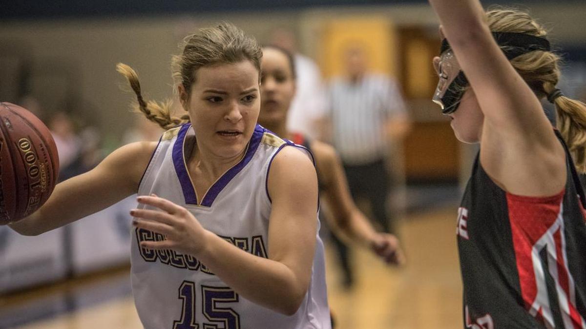 Columbia (Burbank) guard Michelle Maine (now graduated) drives past Seattle Christian's Makenzie May during a 2017 1A regional game at Chiawana High School. The WIAA granted the Coyotes’ request to drop down to the 2B ranks at its January executive board meeting earlier this week. They will compete in the lower classification beginning in the fall.