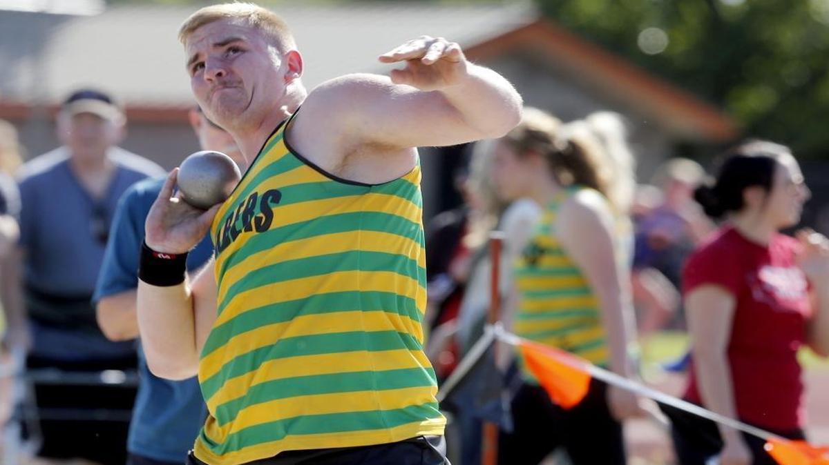 Richland High School’s Matthew Christensen competes in the boys shot put Thursday during a Mid-Columbia Conference track and field meet at Lampson Stadium in Kennewick. Christensen won with a personal-best toss of 50 feet, 7 1/2 inches.