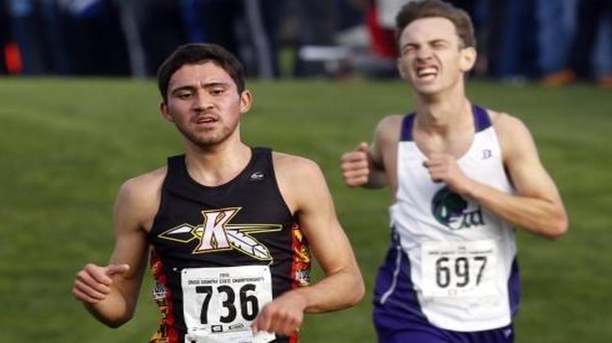 Kamiakin’s Jonah Franco, left, finished fourth in Saturday’s Class 3A boys state championship race in Sun Willows Golf Course in Pasco, leading the Braves to a third-place finish in the team standings. It was the sixth consecutive season the Braves have finished on the podium. See more photos at www.tricityherald.com.