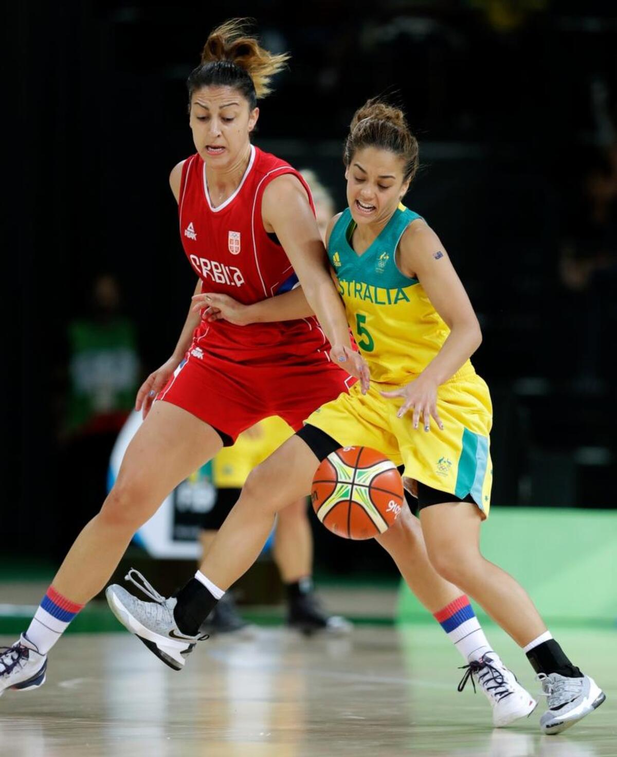 Kennewick native Leilani Mitchell, right, playing for Australia, works against the defense of Serbia’s Jelena Milovanovic during a quarterfinal basketball game in Rio de Janeiro, Brazil. Australia lost 73-71 to be eliminated from medal contention.