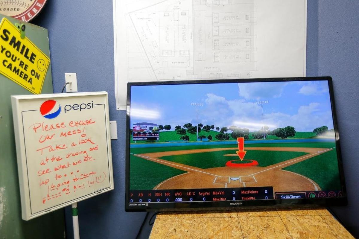 The HitTrax screen shows where the ball would land in a major league ballpark when you are hitting in the batting cage. The Batters Box in Kennewick brought in the baseball simulator last month.