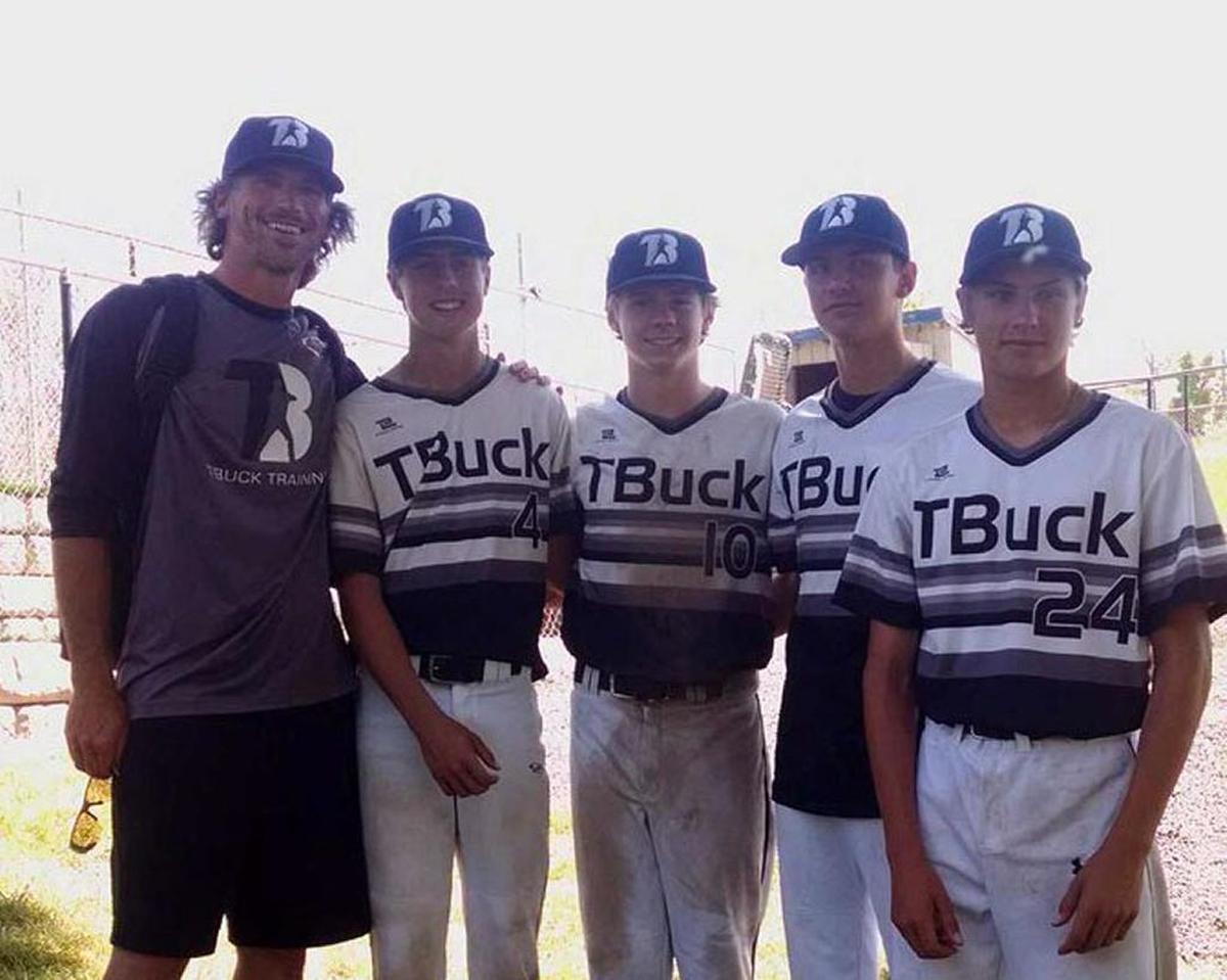 Coach Travis Buck, left, with TBuck Training players Scott Artzer, Ben Fuwel, Hyatt Utzman and Evan Thompson, who were selected to play for Baseball Northwest at the Perfect Game World Series in Cartersville, Ga.