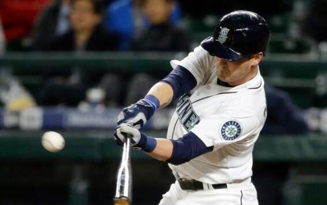 
Mariners outfielder and Kennewick native Shawn O’Malley hits a go-ahead two-RBI single against the Houston Astros in the eighth inning of Tuesday’s baseball game at Safeco Field.
