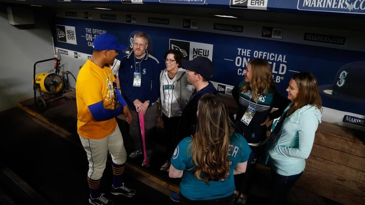 Betsy Haffner, her husband Mark and their five children spent time before the May 15 game in the Seattle dugout with Mariners pitcher Taijuan Walker.
