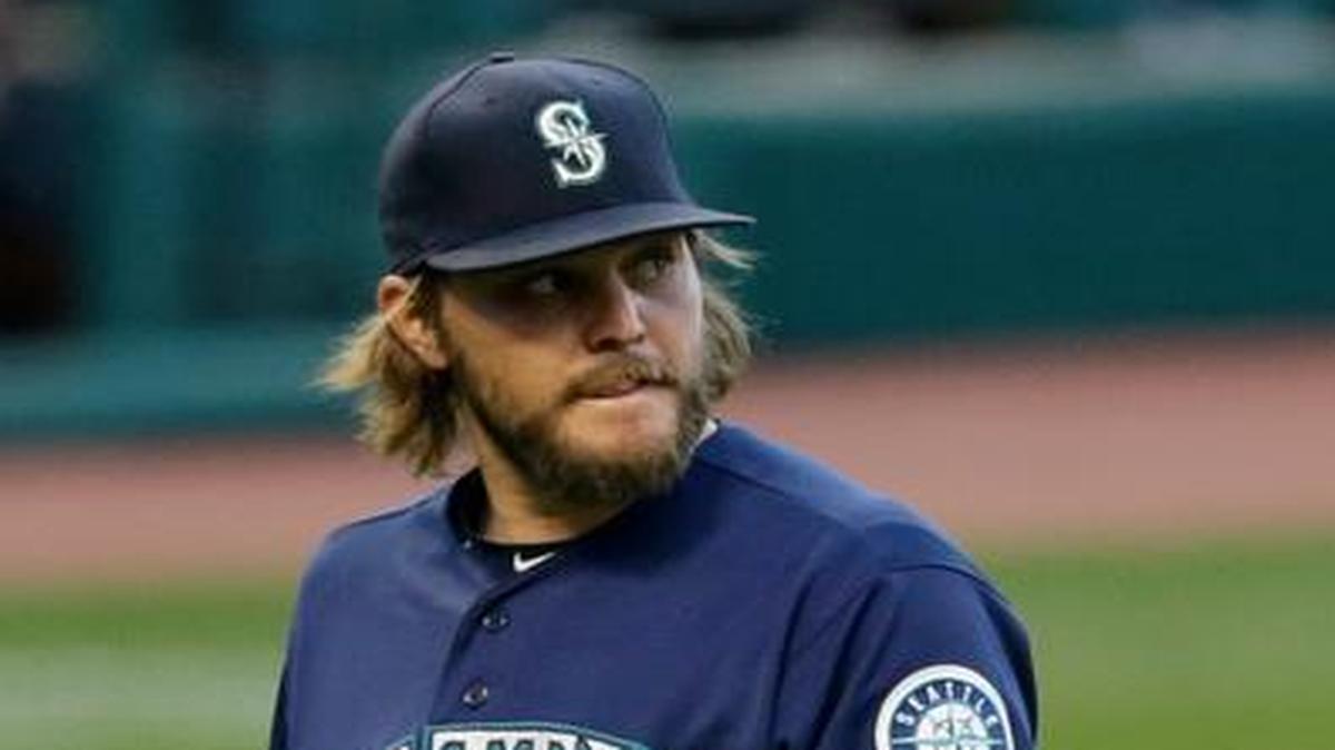 Mariners starter Wade Miley walks to the dugout after being relieved in the fourth inning of Tuesday’s game in Cleveland.