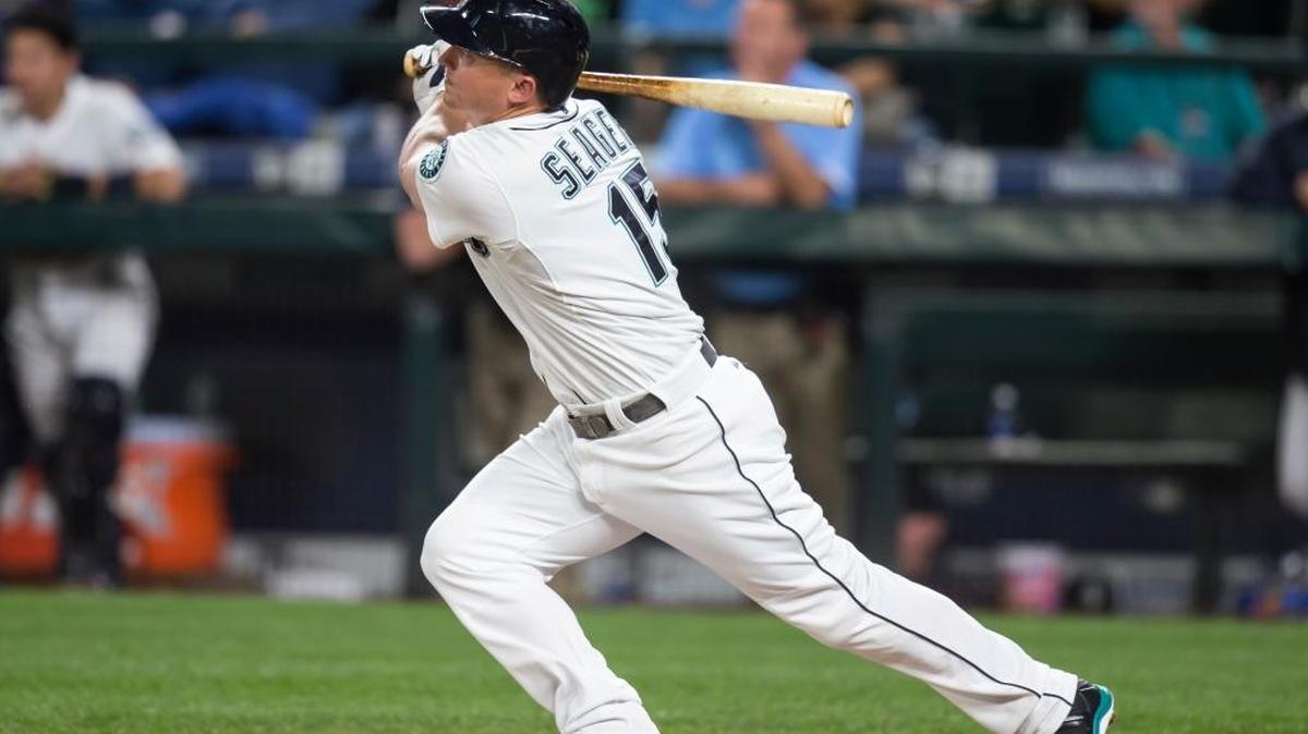 
Kyle Seager watches his two-run home run off Rangers starter Martin Perez in the fifth inning of Wednesday’s game at Safeco Field. The Mariners beat Texas 6-0.
