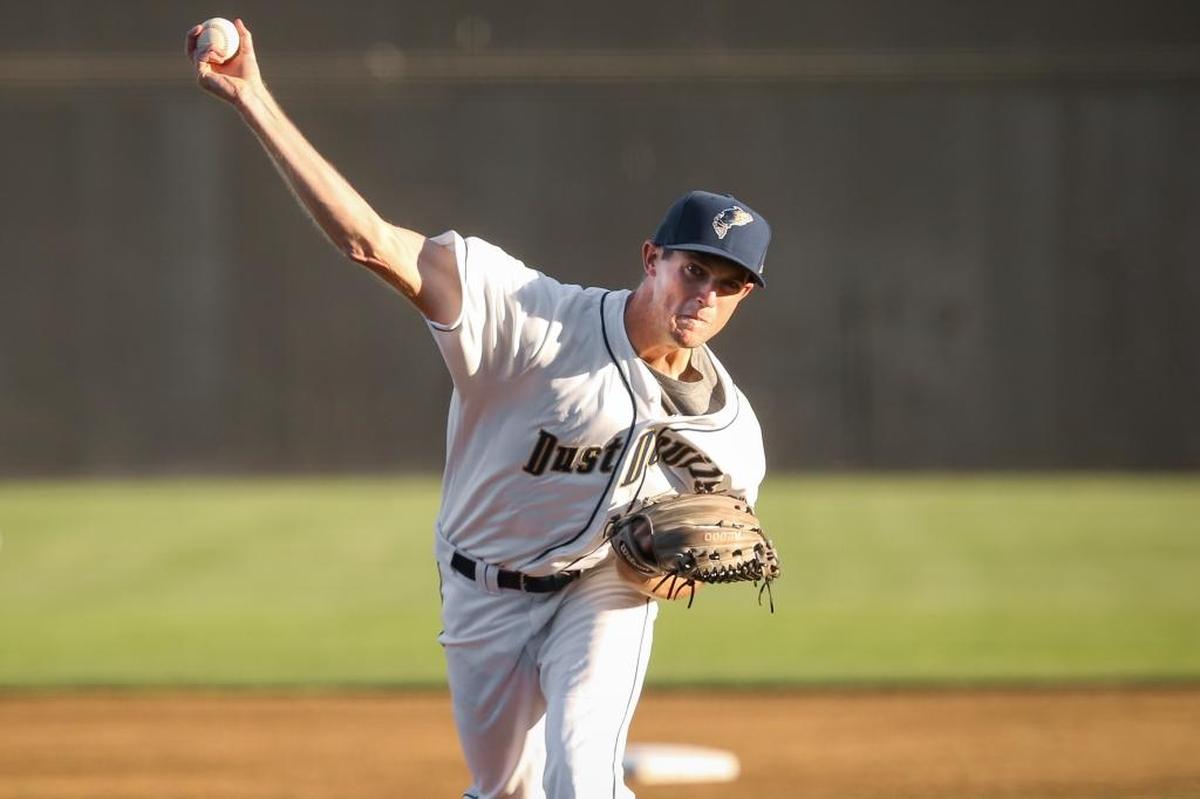 Dust Devils starting pitcher Jim McDade (10) throws a pitch against the Spokane Indians in Tri-City’s home opener Tuesday at Gesa Stadium in Pasco. McDade pitched seven innings, giving up just two hits and striking out 10 to lead the Dust Devils to a 10-0 win.