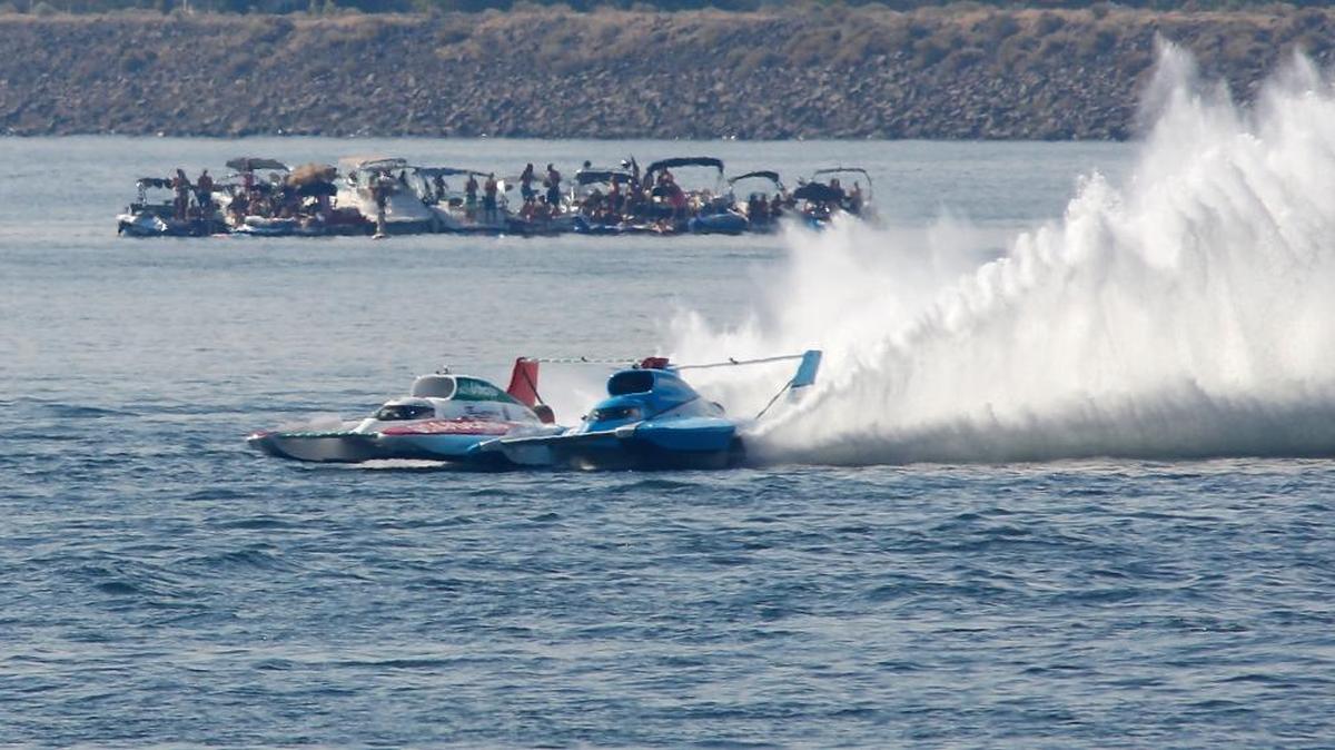 Jimmy Shane, right, in the U-1 Miss HomeStreet Bank and Jean Theoret in the U-16 Oh Boy! Oberto collide Sunday in the top turn of the HAPO Columbia Cup race course during the championship heat.