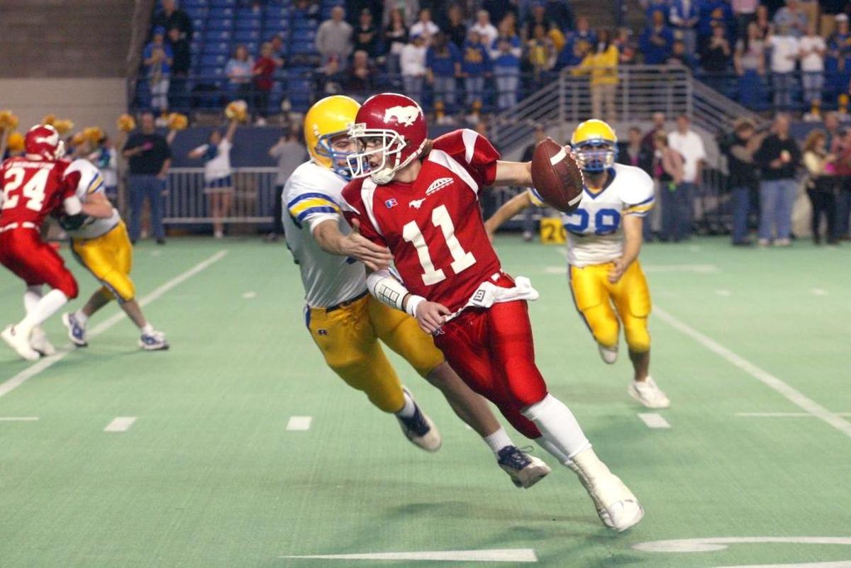 A 2007 graduate of Prosser High School, quarterback Kellen Moore (11) threw for 11,367 yards and 173 touchdowns during his high school career.