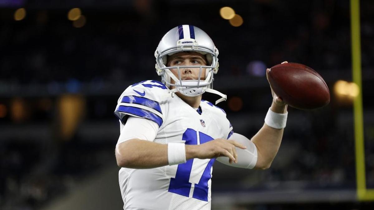Former Prosser High School and Dallas Cowboys quarterback Kellen Moore (17), throwing a pass as he warms up before a 2015 game against the New York Jets, is reportedly retiring from his playing career to take a job as the Cowboys quarterbacks coach. Moore was cut by Dallas earlier this season.