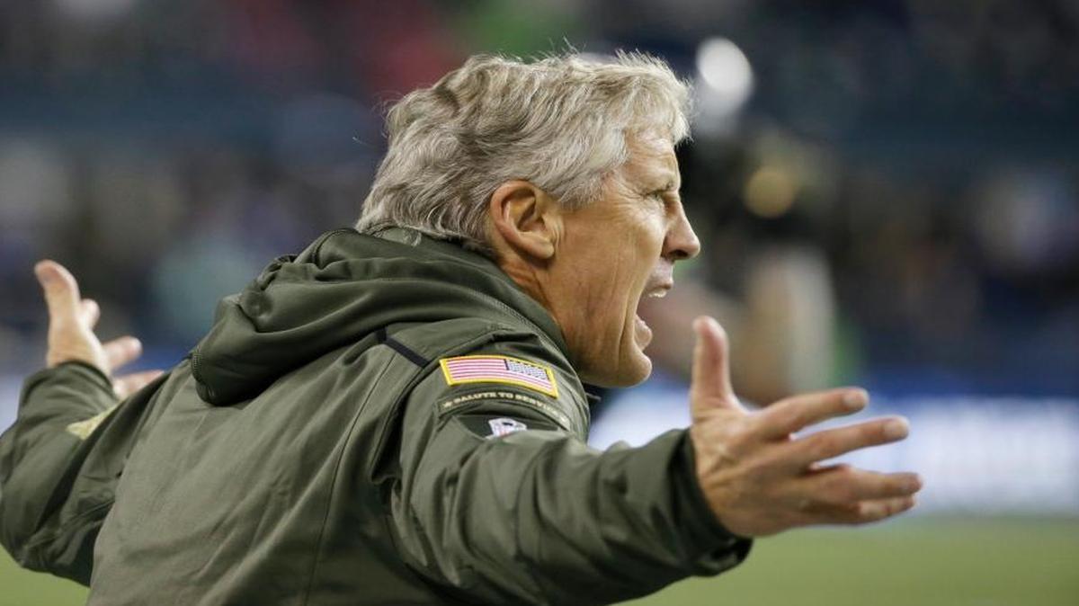 Seahawks coach Pete Carroll protests a call in the second half of Sunday night’s game with the Cardinals. Carroll and his staff have little time left to figure out how to right Seattle’s ship if they hope to return to the playoffs.