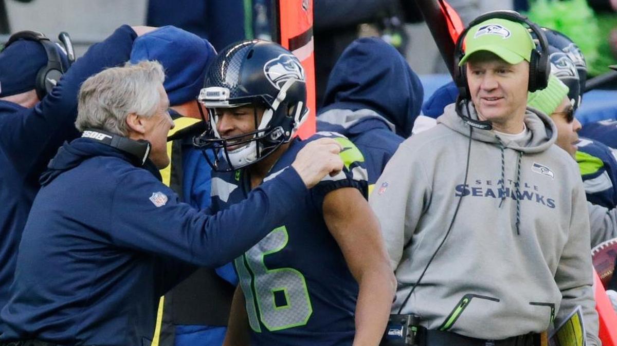 Seattle Seahawks offensive coordinator Darryl Bevell, right, was fired Wednesday, along with offensive line coach Tom Cable.