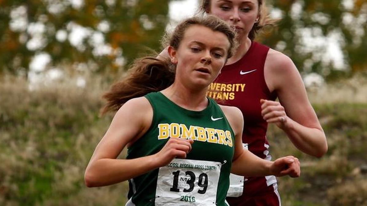 Richland High School’s Katie Andrus competes Saturday during the District 5/8 Class 4A regional cross country meet at Carmichael Middle School in Richland. Andrus finished seventh to advance to next weekend’s state meet in Pasco. See more photos at www.tricityherald.com.