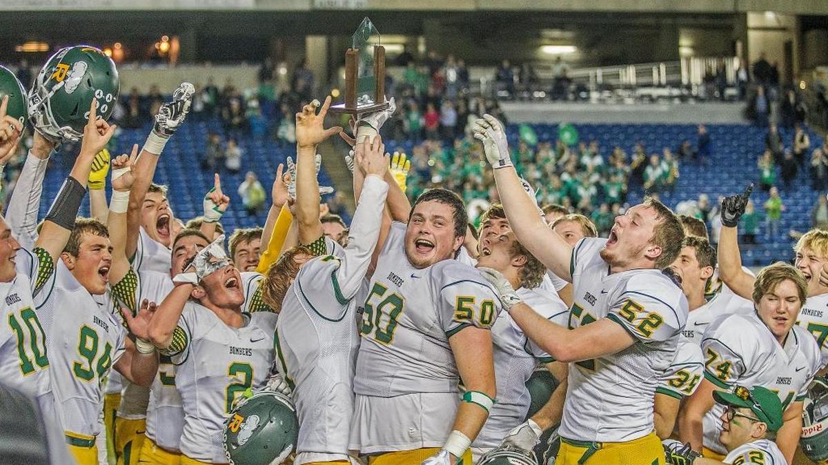 The Richland football team celebrates after beating Woodinville 28-21 to win the WIAA 4A State Football Championship in the Tacoma Dome Saturday, Dec. 2, 2017.