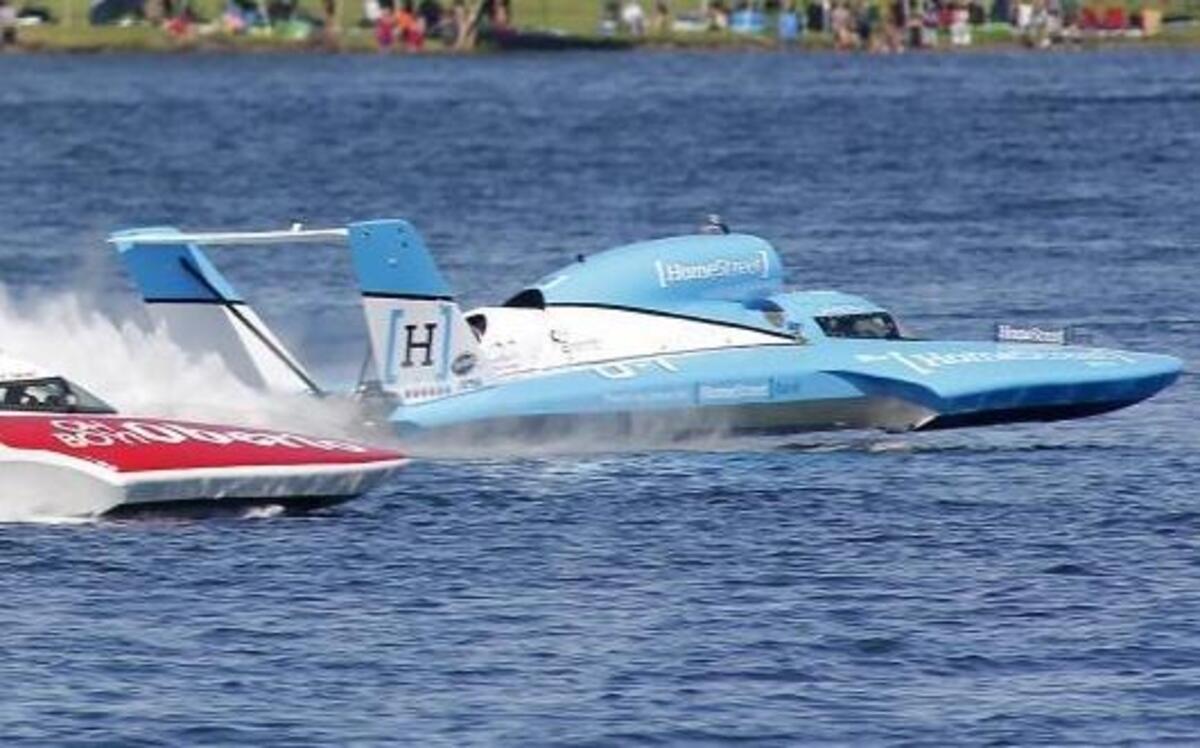 Jimmy Shane, right, in the U-1 Miss HomeStreet Bank runs away from Jean Theoret in the U-16 Oh Boy! Oberto during Heat 2A of the HAPO Columbia Cup on Saturday. Shane won both of his heat races Saturday, and he leads the pack with 870 points entering the final day of racing on the Columbia River.