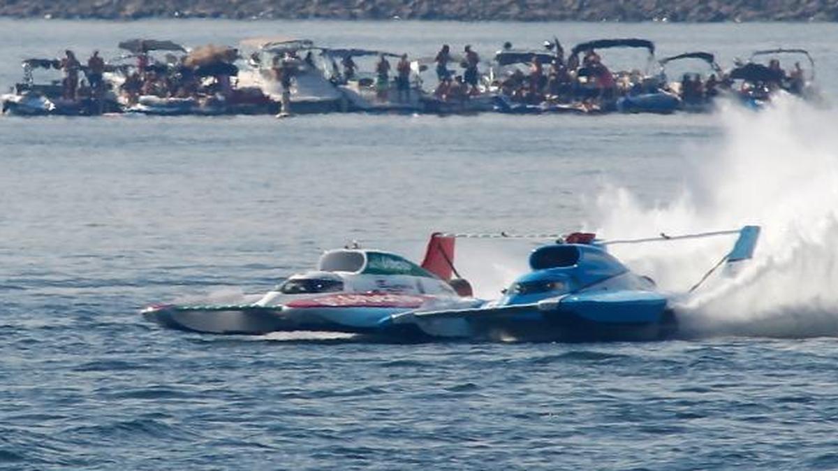 Jimmy Shane, right, in the U-1 Miss HomeStreet Bank and Jean Theoret in the U-16 Oh Boy! Oberto collide Sunday in the top turn of the HAPO Columbia Cup race course during the championship heat.